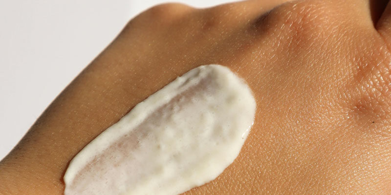 may-2024-blog-malanoma sunscreen on hand